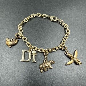 Diamond International DI Gold Tone Charm Bracelet Totem Bear Fish